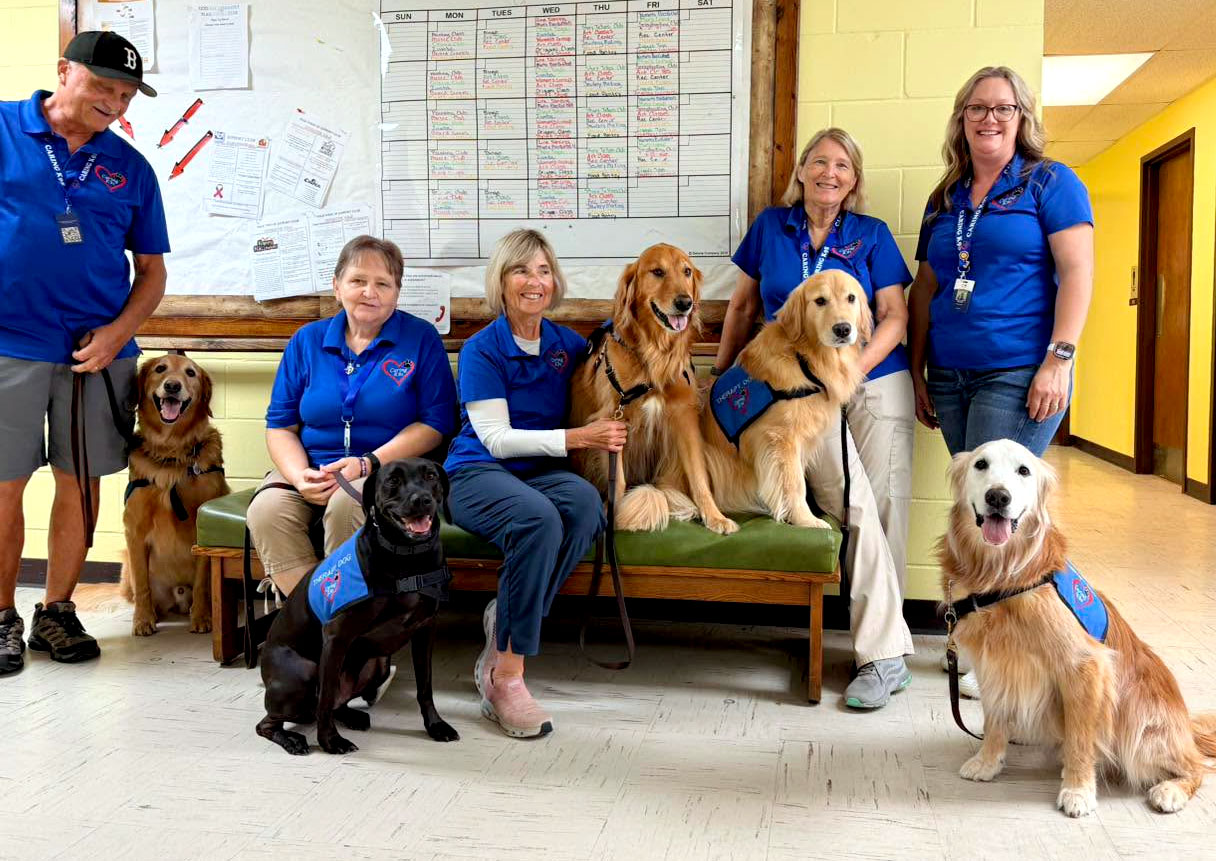 Caring K9s visiting the Key Training Center